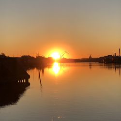 Silhouette of marina at sunset