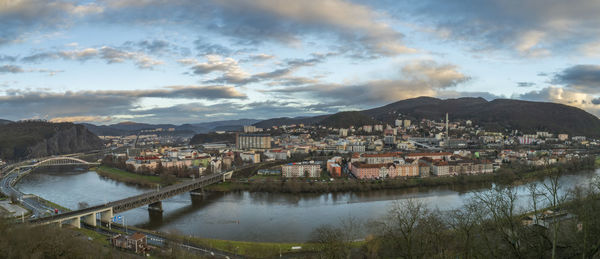 High angle view of bridge over river against sky at sunset