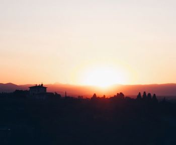 Scenic view of landscape against sky during sunset