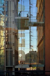 Reflection of buildings on glass window