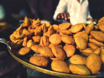 Close-up of breads for sale at market stall