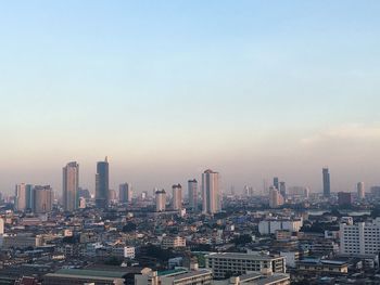 Modern buildings in city against sky