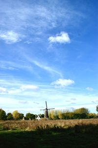 Built structure on field against sky