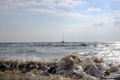 View of sea against cloudy sky