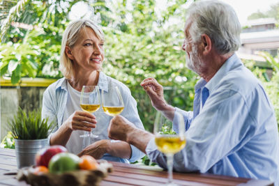 People in a drinking glass outdoors