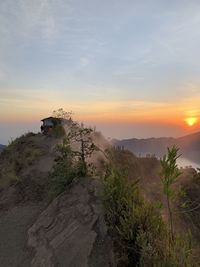 Scenic view of mountains against sky during sunset