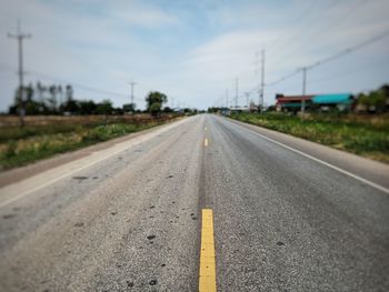 Surface level of road against sky