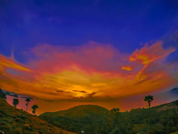 Scenic view of dramatic sky during sunset