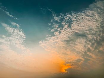 Low angle view of dramatic sky during sunset