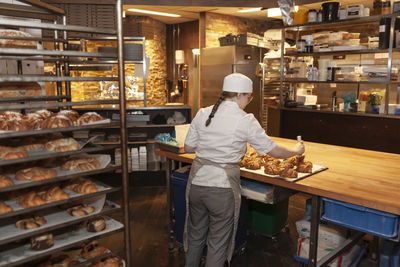 Female baker in bakery