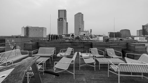 Empty chairs and tables in rows