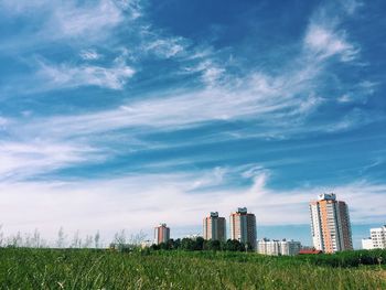 Modern cityscape against sky
