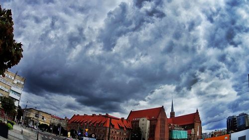 Low angle view of city against sky