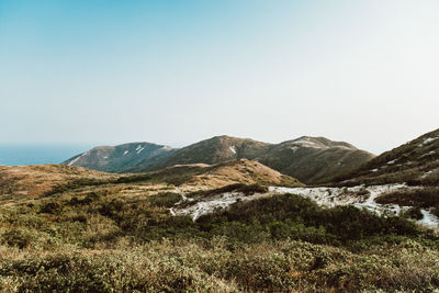 Scenic view of mountains against clear sky