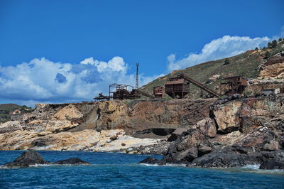 Old iron ore mine on the rocks of elba island