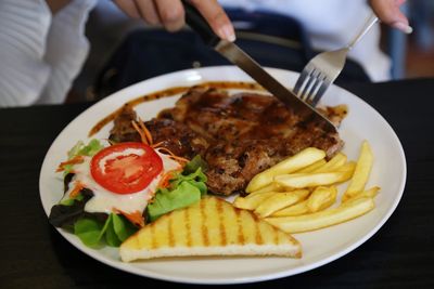 High angle view of meal served in plate on table