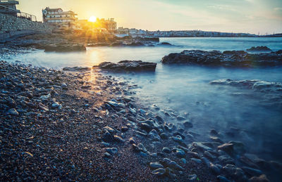 Scenic view of sea during sunset