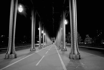 Illuminated road at night