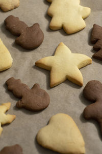 Close up of chocolate and vanilla biscuits for christmas bake in the oven.