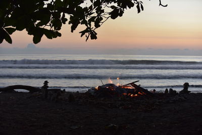 Scenic view of sea at sunset