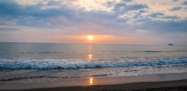 Scenic view of sea against sky during sunset