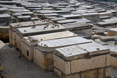 Tombstones in jewish cemetery on sunny day