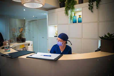 Woman working on table