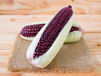 Close-up of corn on table