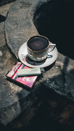 High angle view of coffee cup on table