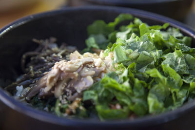 Close-up of meat and salad in bowl