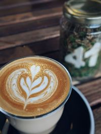 High angle view of cappuccino on table