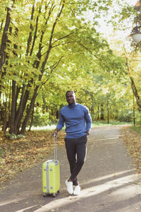 Rear view of man standing in park