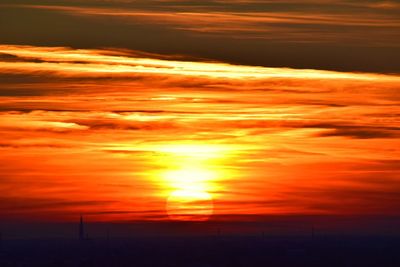 Scenic view of orange sky