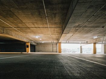 Empty road in illuminated building