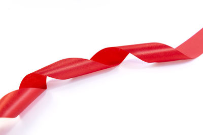 Close-up of christmas decorations over white background