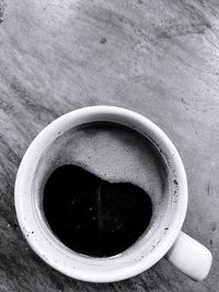 High angle view of coffee cup on table