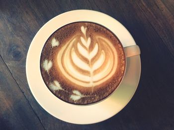High angle view of cappuccino on table