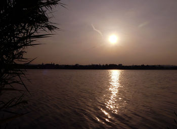 View of calm sea at sunset