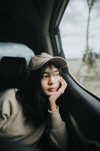 Portrait of woman in car