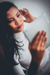Portrait of a beautiful woman at home