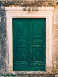 Closed door of old building