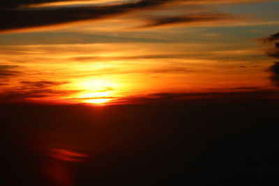 Scenic view of dramatic sky during sunset
