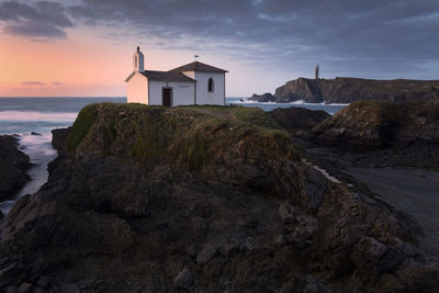 Hermitage and lighthouse on the coast