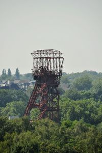 View of built structure on landscape against clear sky