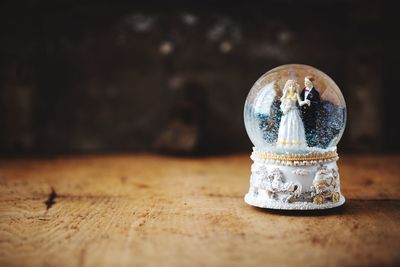 Close-up of old tea cup on table