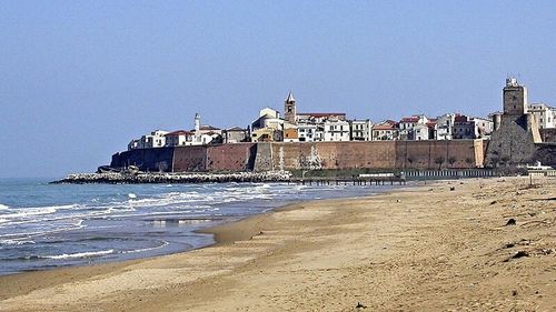 View of beach against clear sky