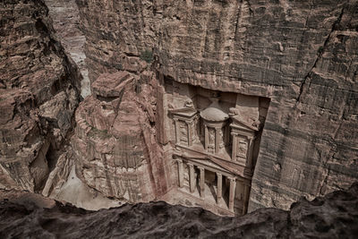 Low angle view of rock formation on building