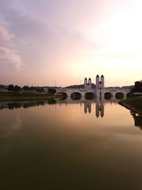 Scenic view of lake against sky during sunset