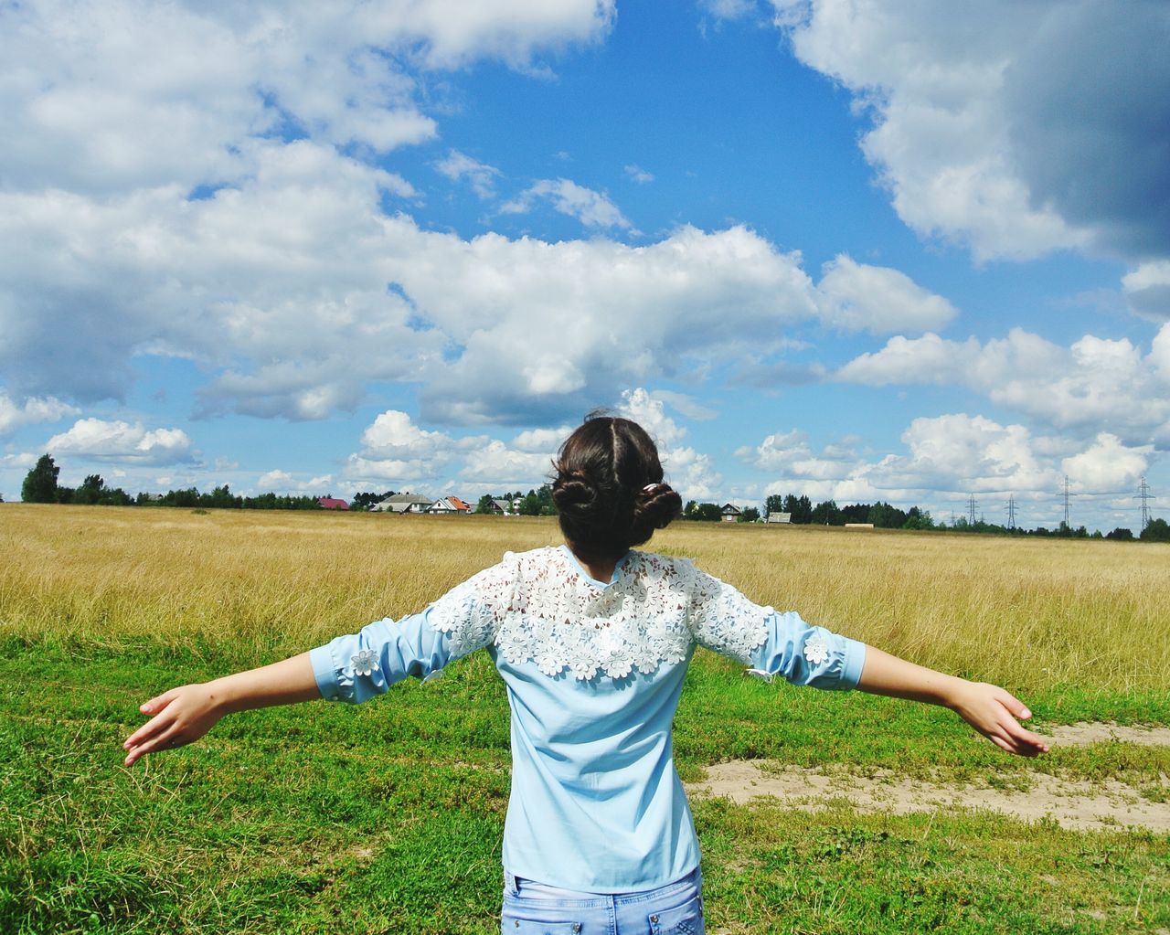 grass, sky, field, lifestyles, leisure activity, casual clothing, grassy, cloud - sky, landscape, rear view, standing, waist up, cloud, childhood, nature, full length, green color, men