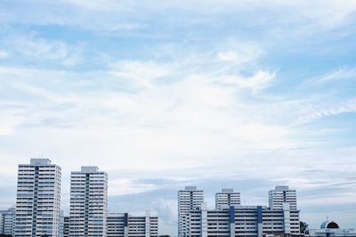 Modern cityscape against sky